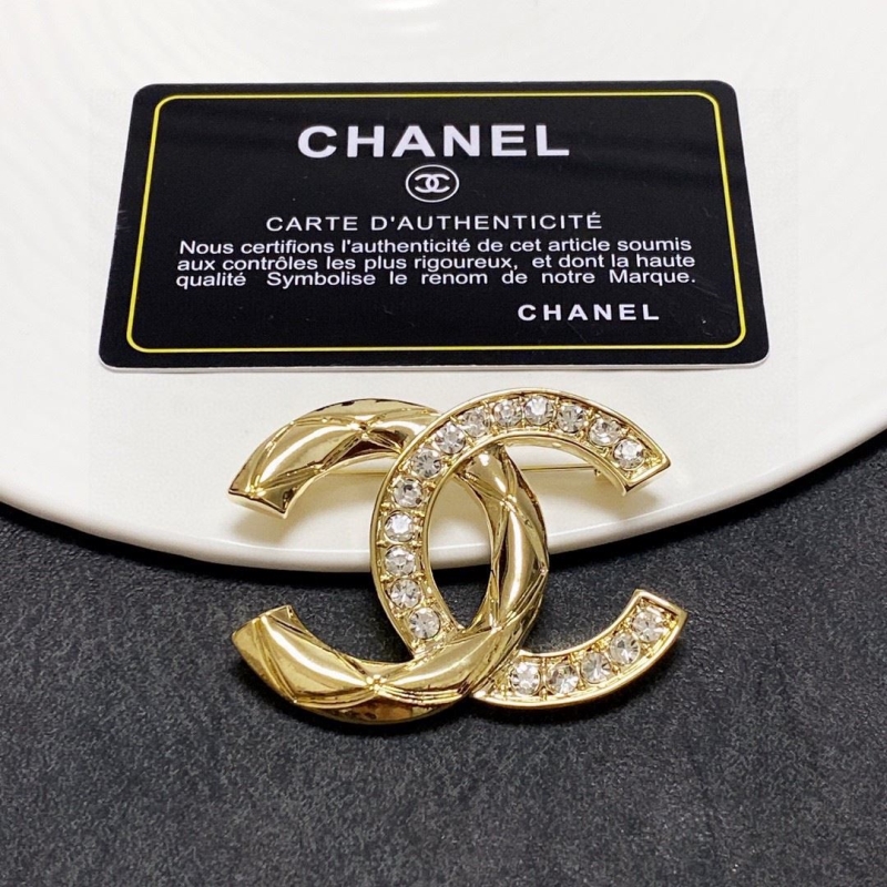 Ch*el brooches